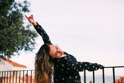 dancer dancing against cityscape