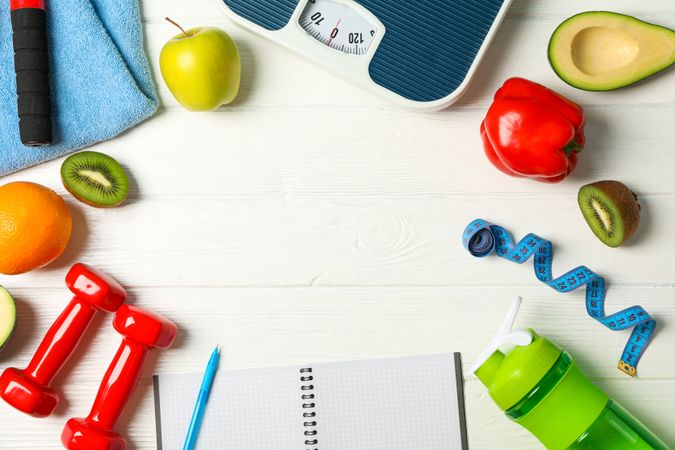 Flat lay composition with loss weigh accessories on blank wooden background