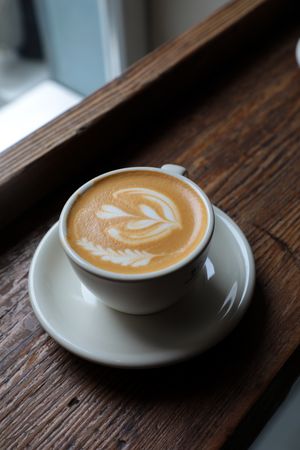 Delicious hot coffee with latte art
