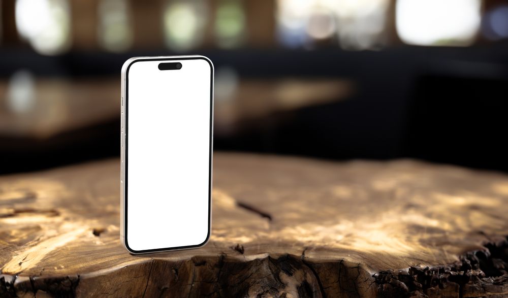 Smartphone mockup on restaurant table