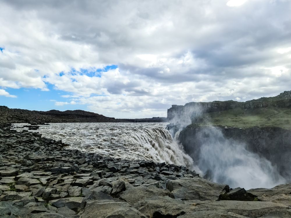 Majestic icelandic waterfall cascading over rocks