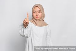 Stern Asian Female In Headscarf With Finger Up - Free Photo (0vexdb 