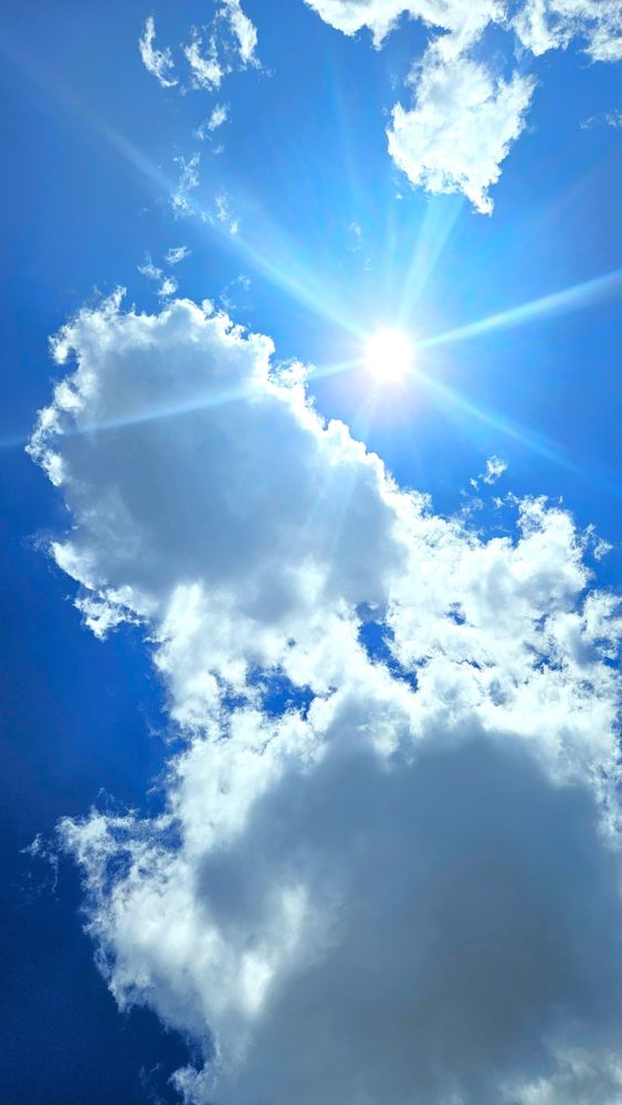 blue sky clouds and sun