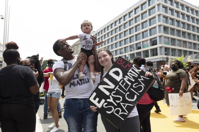 Happy family at an anti-racism protest, Washington, D.C.