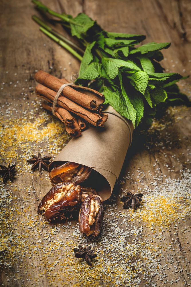 Dates fruits with walnuts, mint and cinnamon for Ramadan