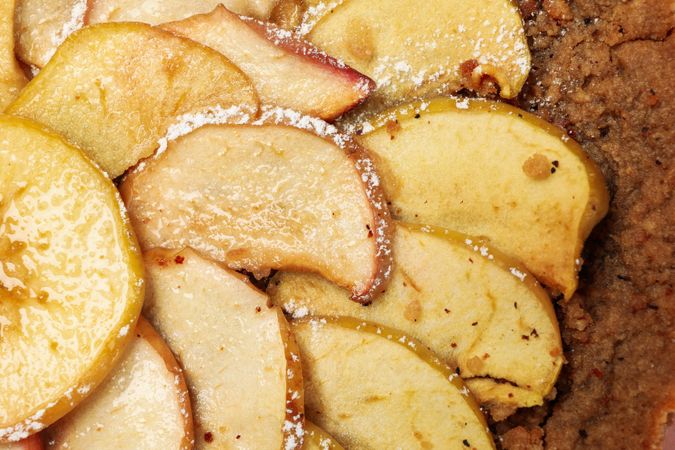 Tasty apple pie on whole background, close up. Homemade food