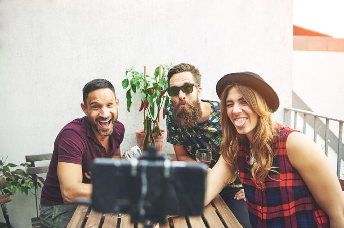 Friends making goofy faces while taking a photo