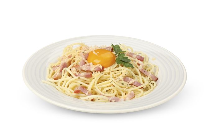 Plate with tasty pasta isolated on plain background