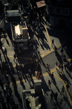 High-angle view of people walking on street