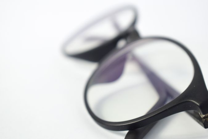 Close up of spectacles in plain studio background