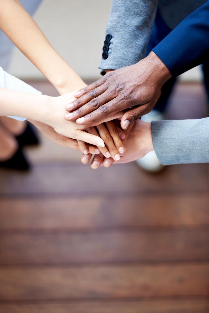 Multi-ethnic hands together
