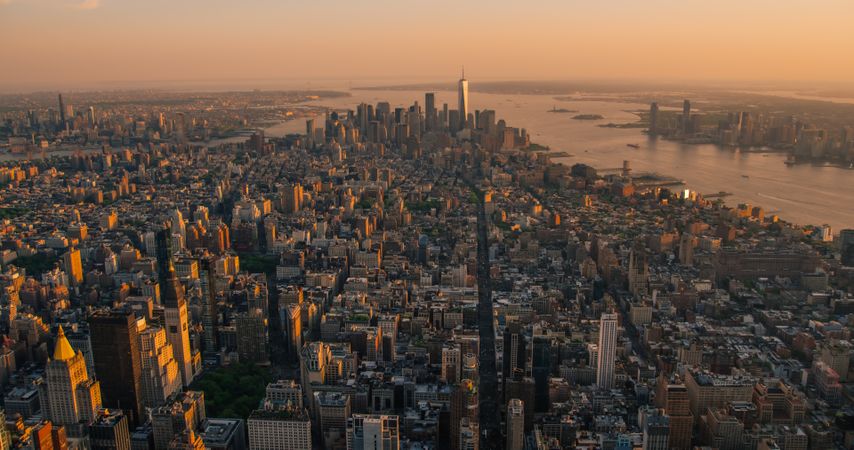 Aerial View of Lower Manhattan Architecture. Panoramic Shot of Wall Street Financial Business District from a Helicopter. Scenery of Historic Office Buildings and Skyscrapers in New York City