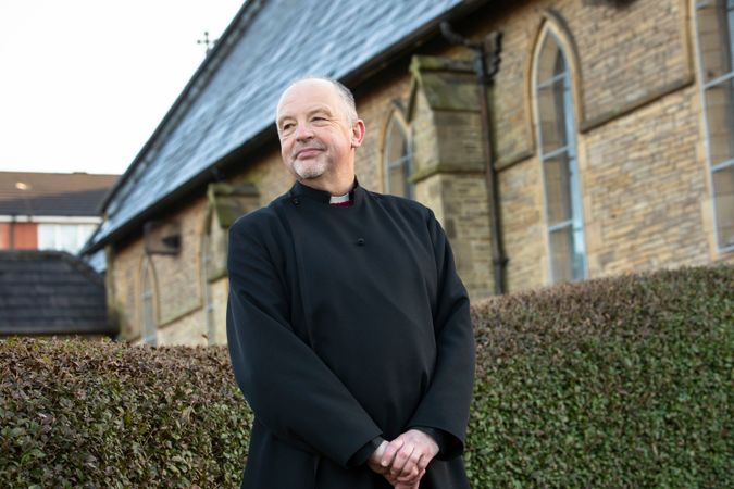 Vicar outside church