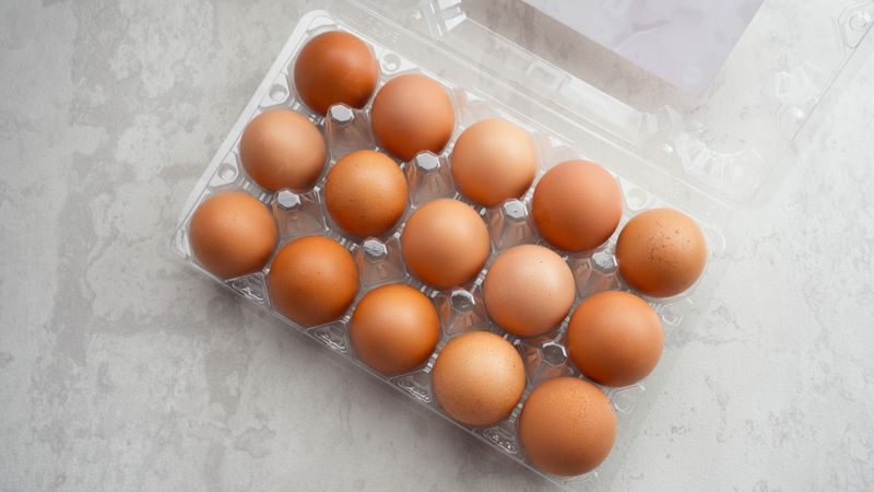 Organic chicken eggs in plastic packaging