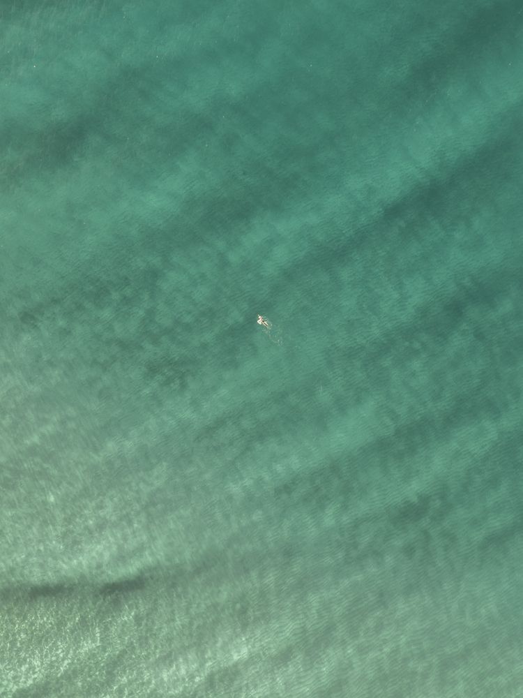 Top view of blue green ocean water in Australia