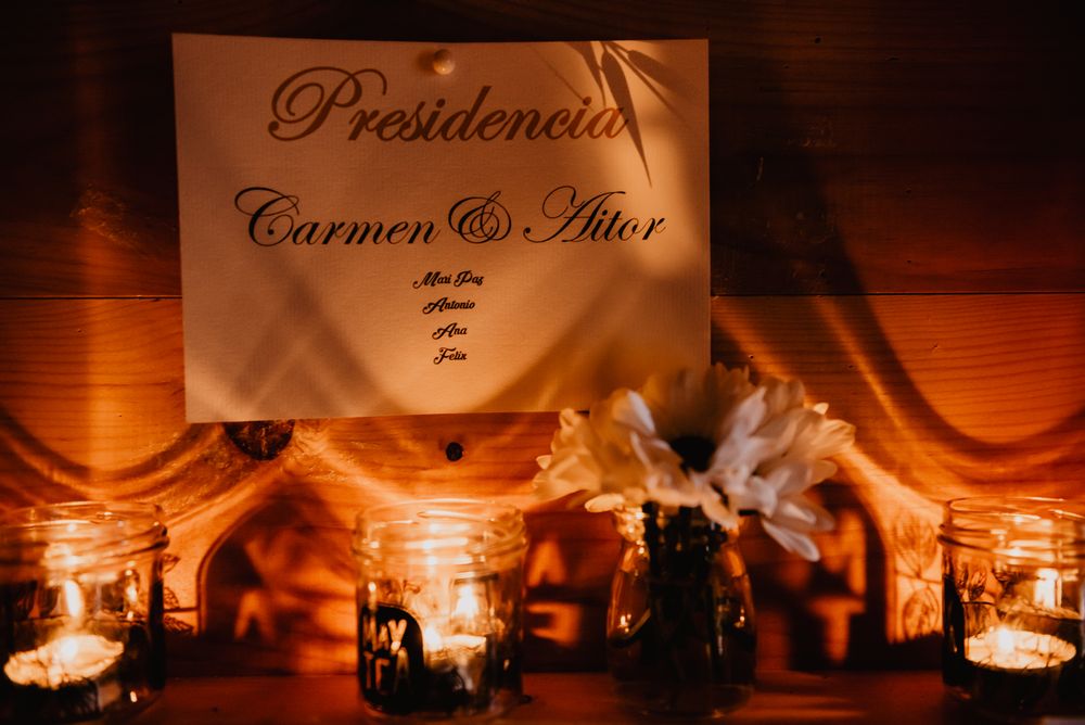 Wall with wedding decorations on shelves