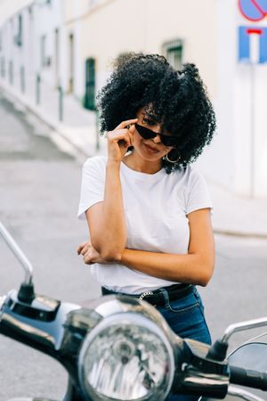 Stylish Black female on motorbike