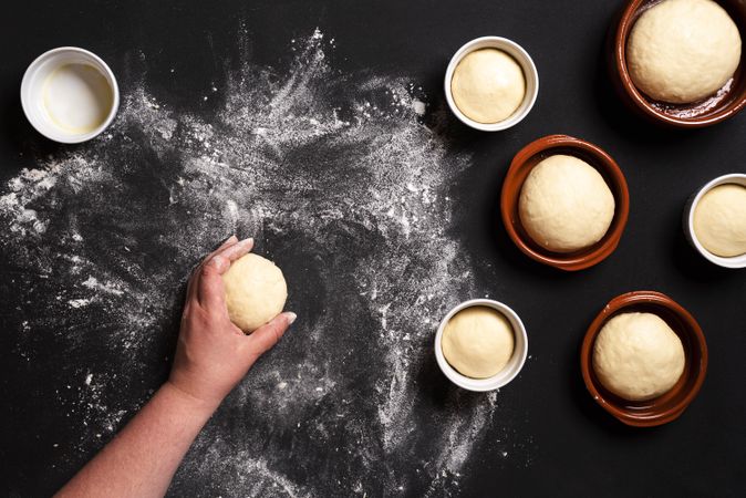 Top view of bread dough in ramekins