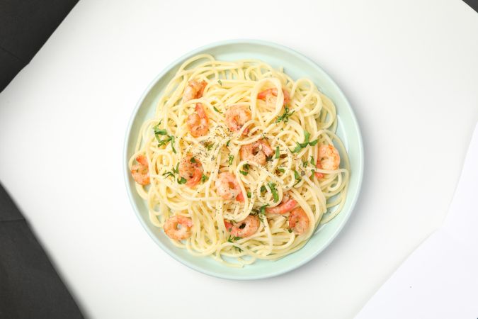 Plate with tasty pasta isolated on plain background