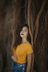 woman near plant roots