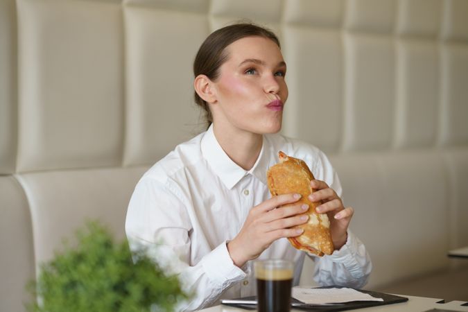 Woman with sandwich
