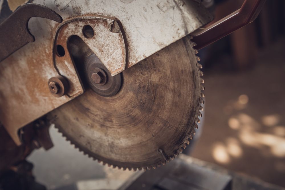Close up of circular electric saw blade in carpentry workshop