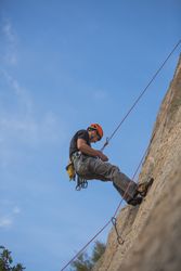 Man climbing a rock
