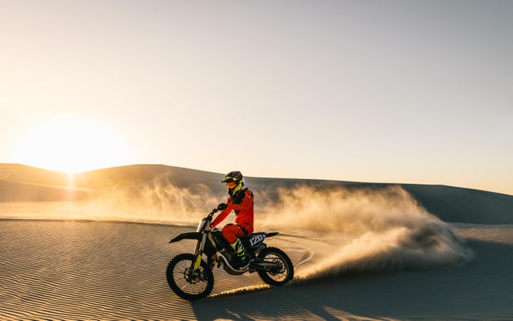 Dirt biking on sand dunes