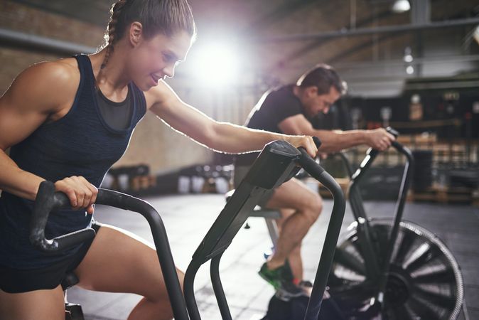 Athletic trainers doing HIIT workout exercise