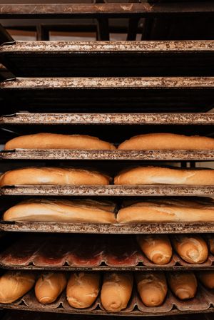 Shelves with fresh bread and buns