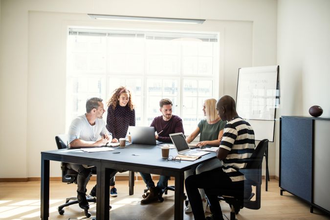 Group of people collaborating in office