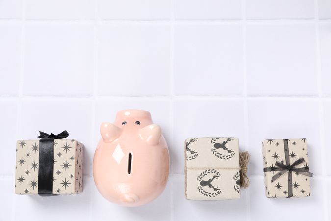 Concept of Christmas finance with piggy bank, space for text