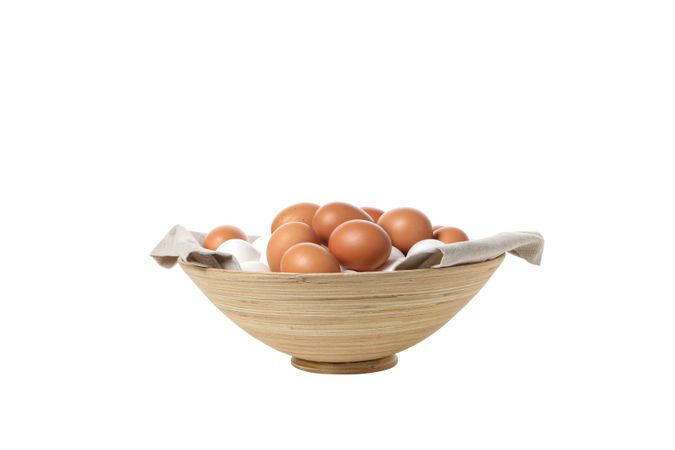 eggs in a deep dish, isolated on blank background.
