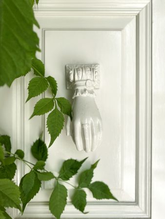 Patmian knocker close up of cream hand