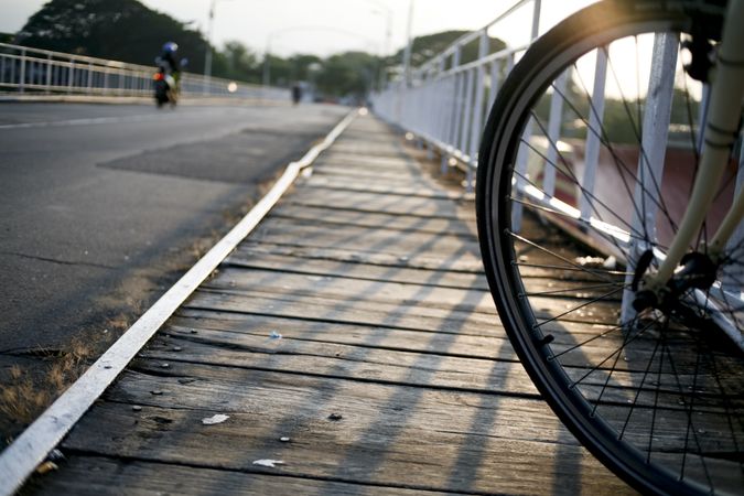 Wheel of a bike on a bridge