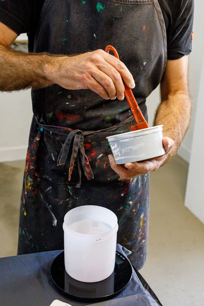 male artist preparing paints