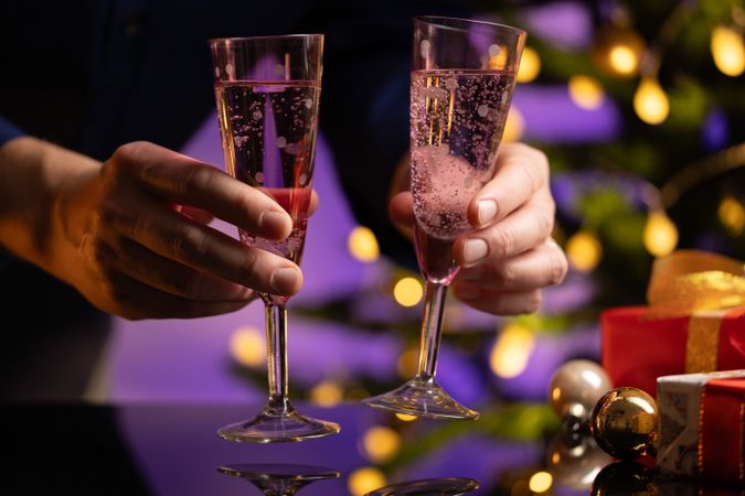 Businessman Holding Two Champagne Glasses Christmas