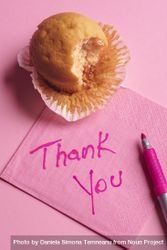 Thank you message hand-wrote on a pink napkin 5w9ymb