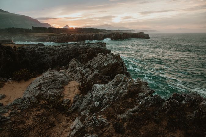 edge of cliff near water