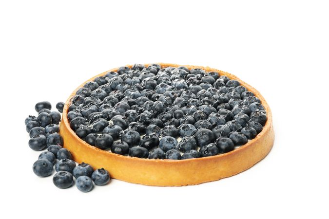 Tasty blueberry pie isolated on light background