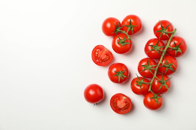 Fresh ripe tomatoes on neutral background, top view