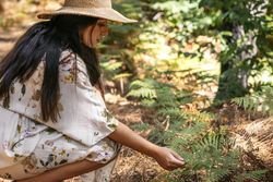 Woman enjoying a day in nature in the forest