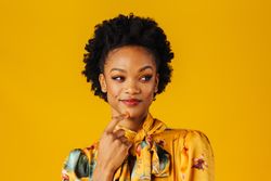 Beautiful Black woman making an inquisitive expression