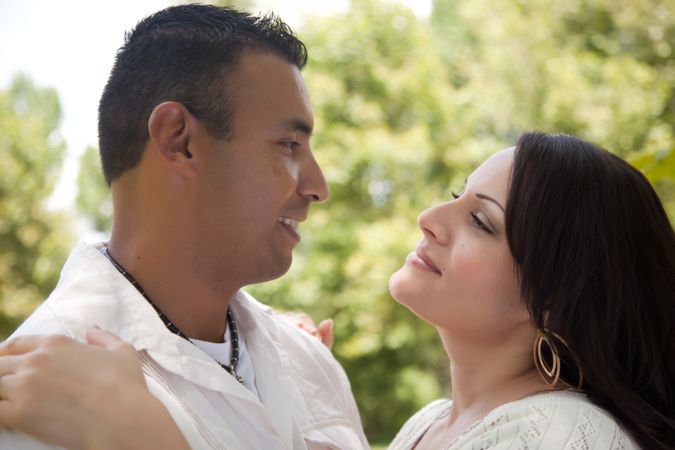 Attractive Hispanic Couple in the Park