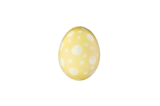 Decorative easter egg isolated on light background. Festive tradition