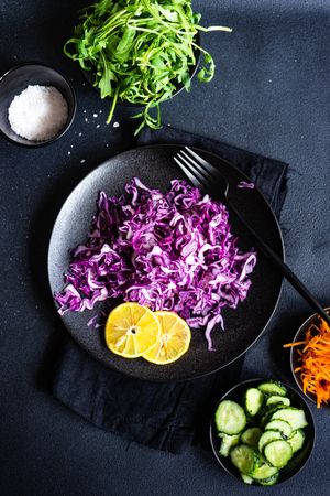 Looking down at fresh salad bowl with red cabbage