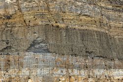 Rough wall of stone quarry