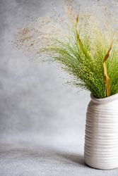 Elegant arrangement in vase with copy space