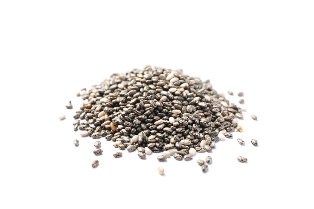 Heap of chia seeds isolated on blank background