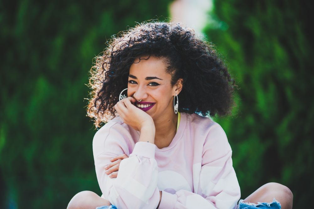 Portrait of modern Black woman with curls